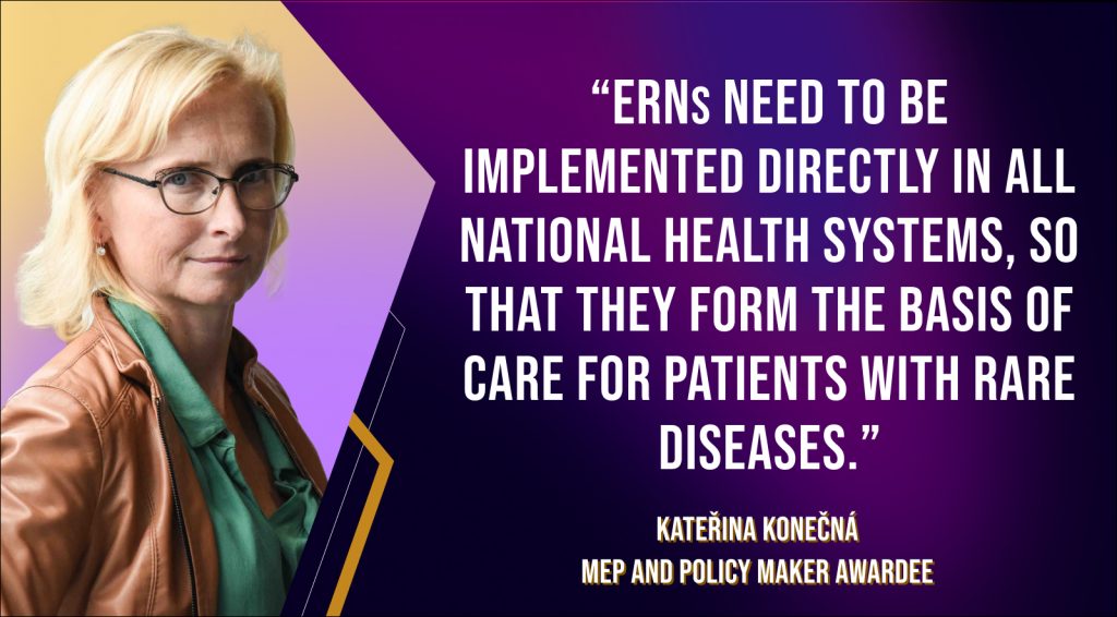Purple and gold geometric quote card featuring an image of Kateřina. Reads “ERNs need to be implemented directly in all national health systems, so that they form the basis of care for patients with rare diseases.”