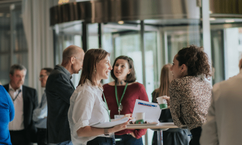 People having a discussion around the table at a Eurordis event